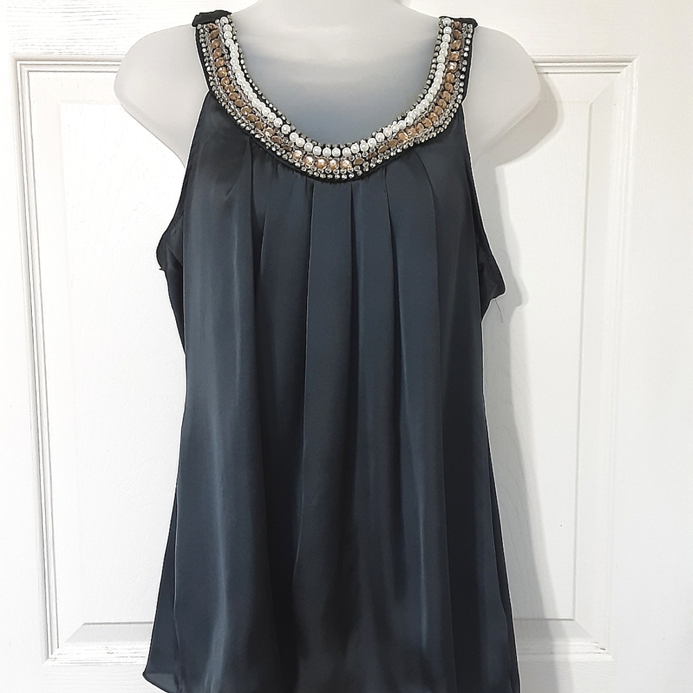 Peridot sleeveless blouse with jeweled neckline size small.